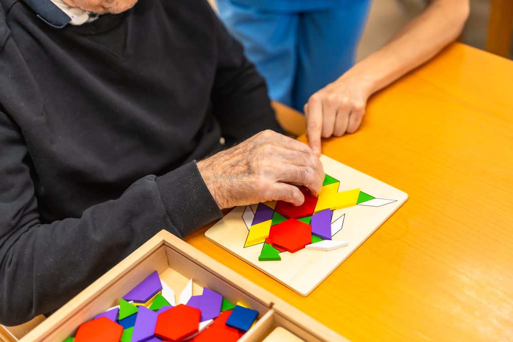 Close-up of an senior man playing board games.