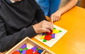 Close-up of an senior man playing board games.